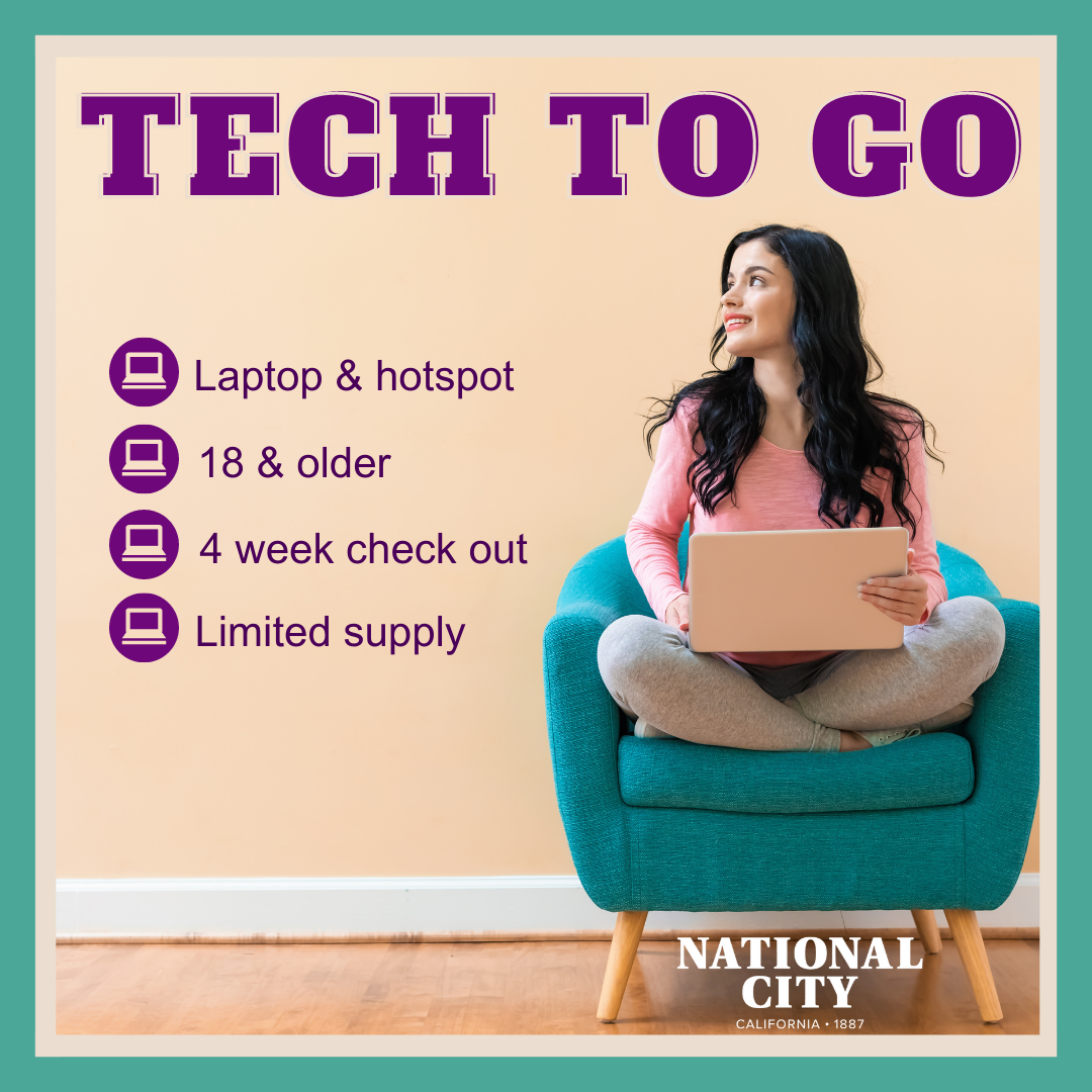 Woman sitting on chair holding a laptop